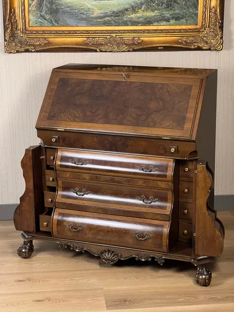 Bureau from the side with the drawers pulled out.