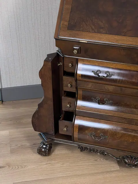 The lower drawers and the claw-and-ball foot.