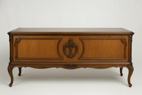 Executive desk seen from the back, with a carved cartouche on the panel.