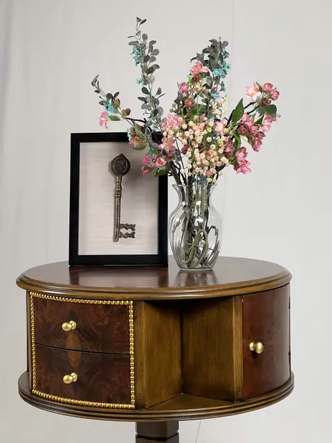 Closer view of the drawer fronts and the brass beading around them.