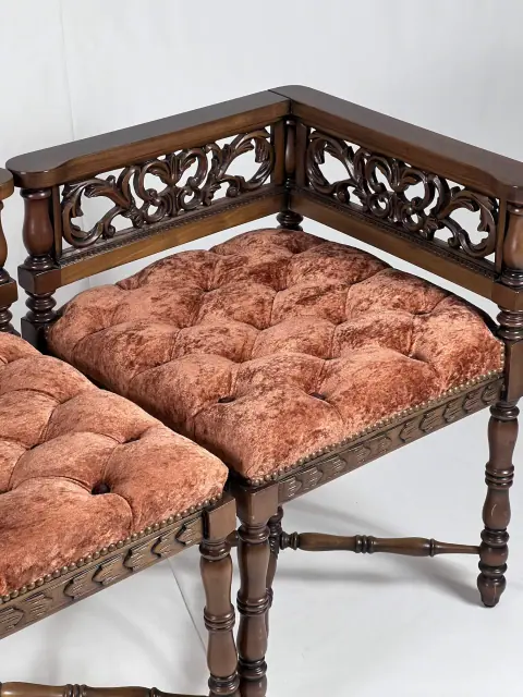 Looking down on the two buttoned cushions that meet at the corner.