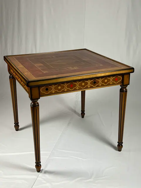Games table closed, with inlaid banding around the top and the frieze.
