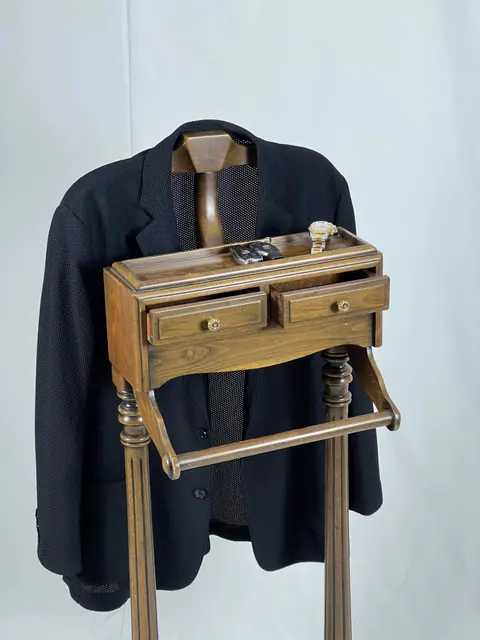 Open tray on top of the stand, holding a watch and cufflinks.